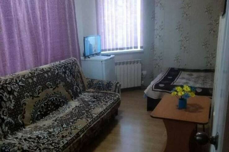 Четырёхместная комната с удобствами и балконом