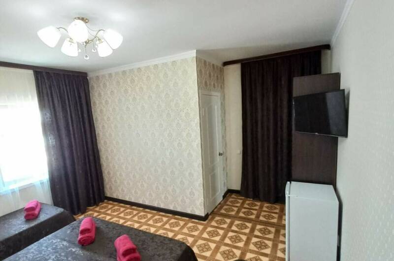 Семейный номер с мини-кухней на 2−4 чел