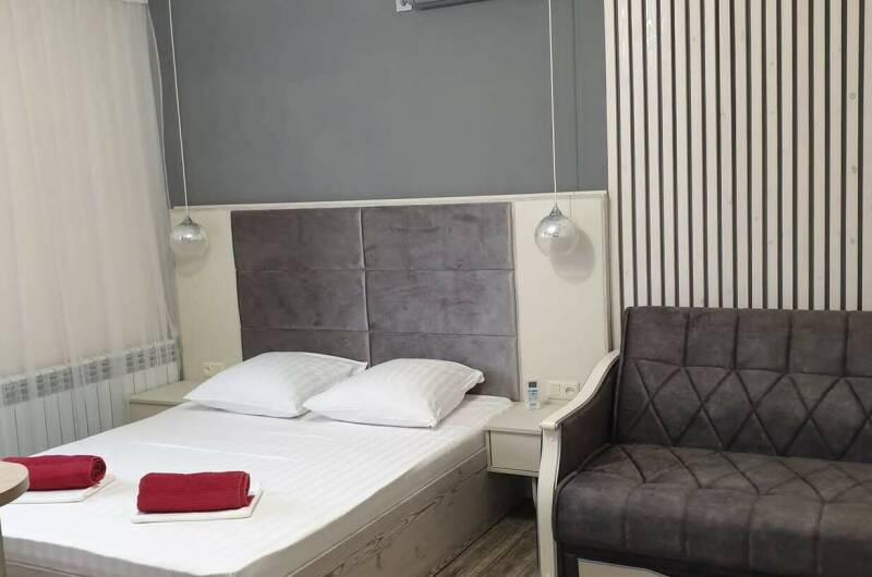 Номер «Комфорт +» с мини-кухней на 2−4 чел