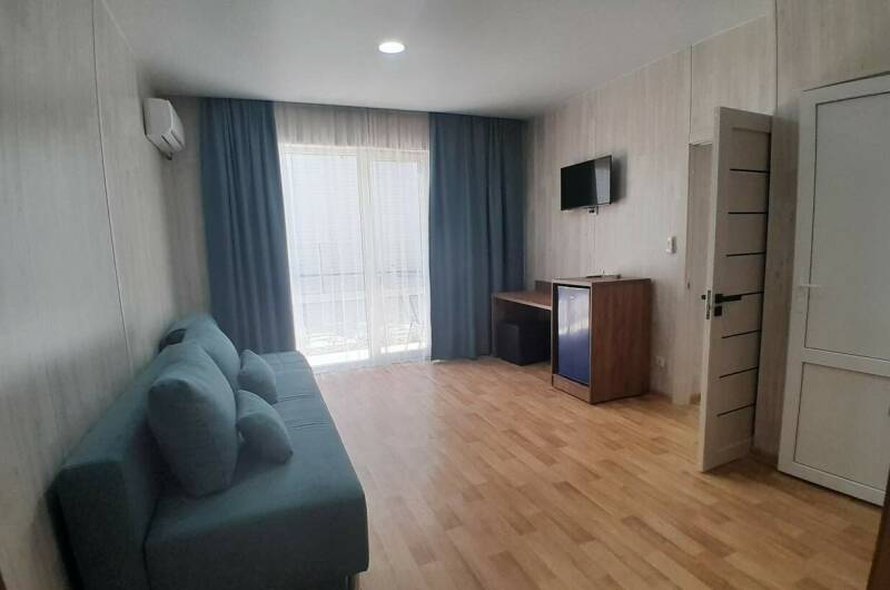 Четырехместный номер с удобствами и мини-кухней