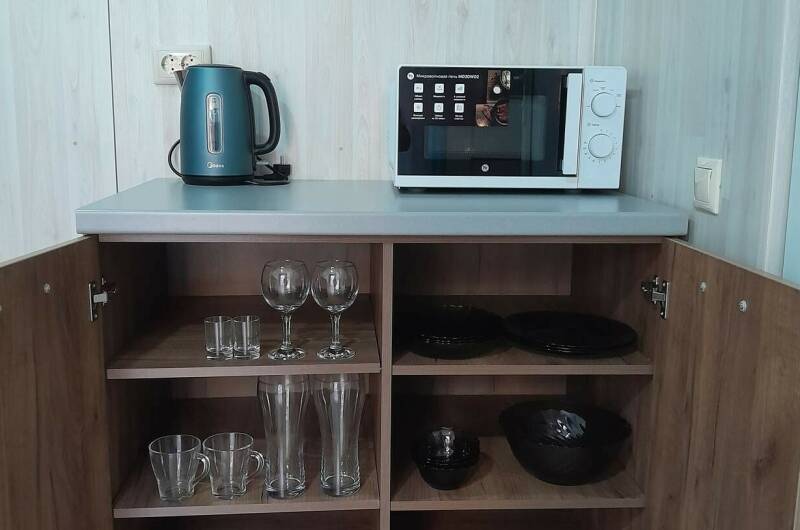 Четырехместный номер с удобствами и мини-кухней