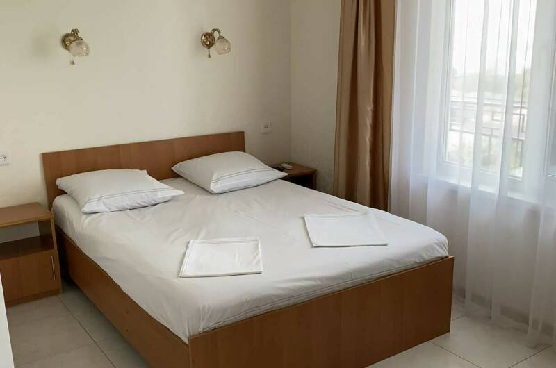 Трёхместный номер с видом на море