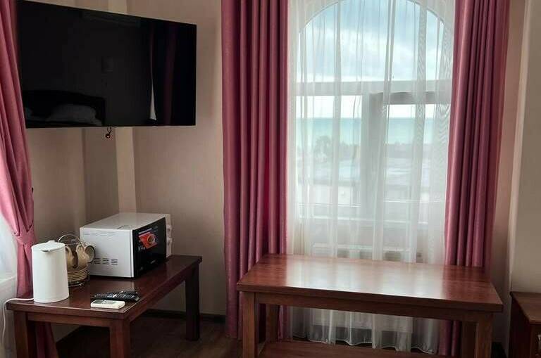 Пятиместный люкс с двумя балконами и видом на море