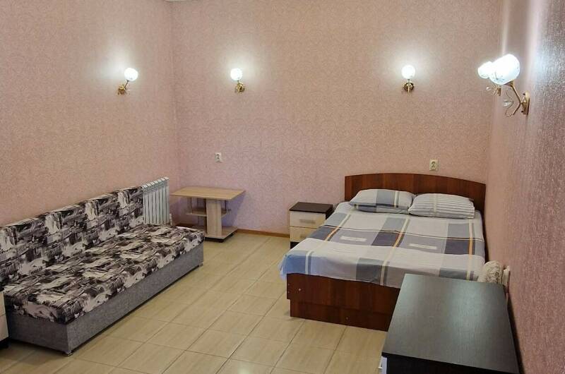 «Четырехместный» стандартный номер с удобствами