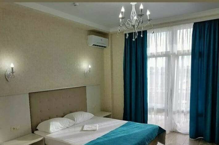 Трехместный номер с балконом