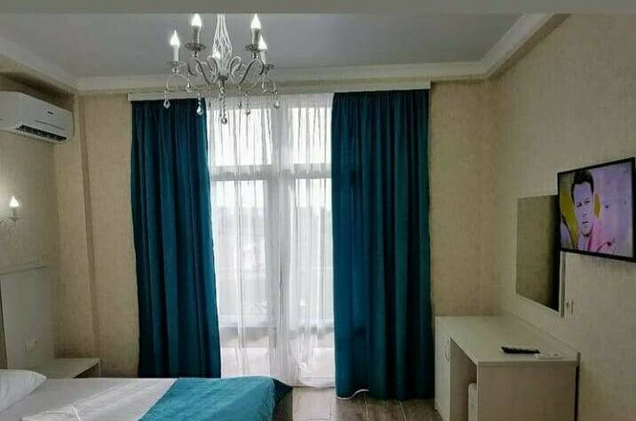 Трехместный номер с балконом