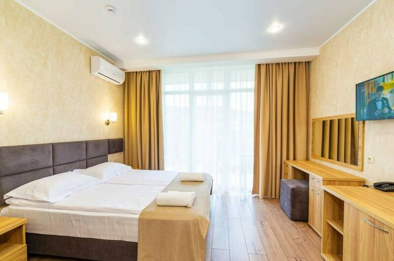 Трёхместный стандарт с балконом