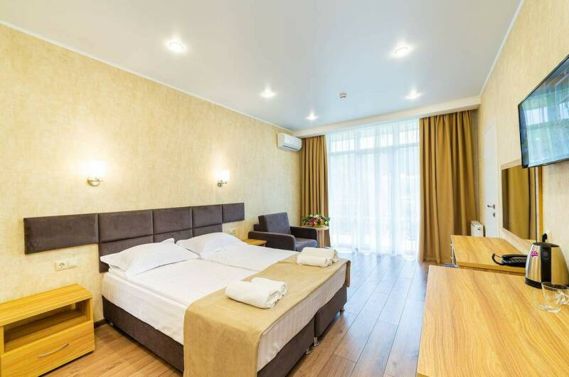 Трёхместный стандарт с балконом