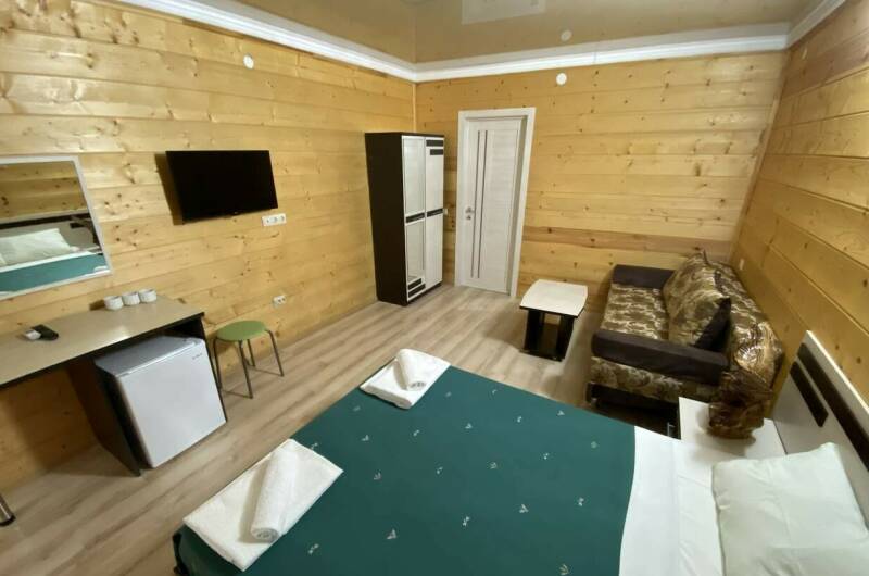 Четырехместный номер Делюкс с балконом