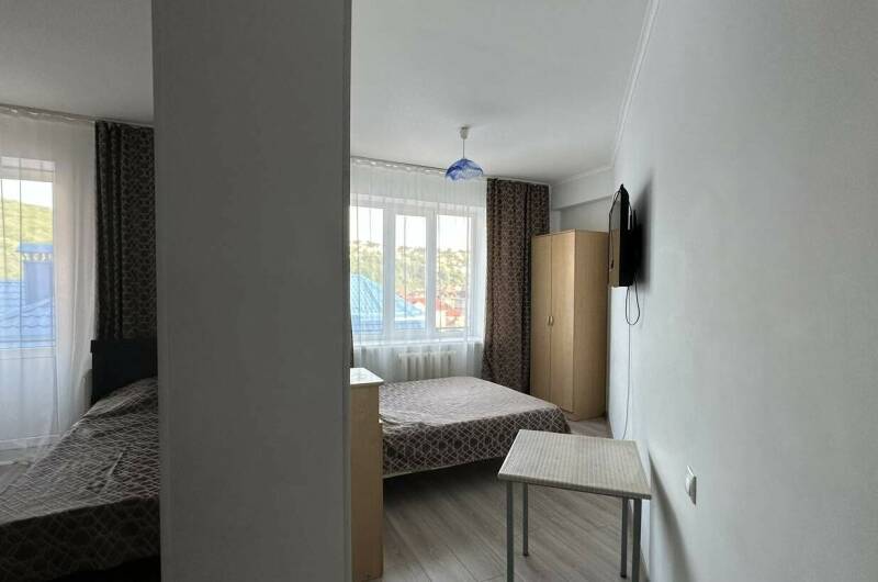 Семейный 4хм номер с перегородкой и балконом