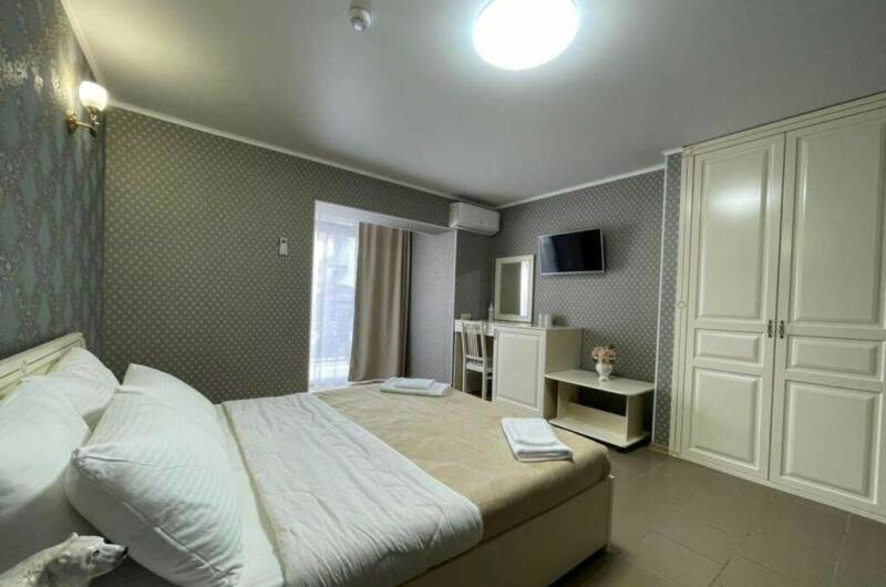 Четырехместный номер Делюкс с балконом с завтраком