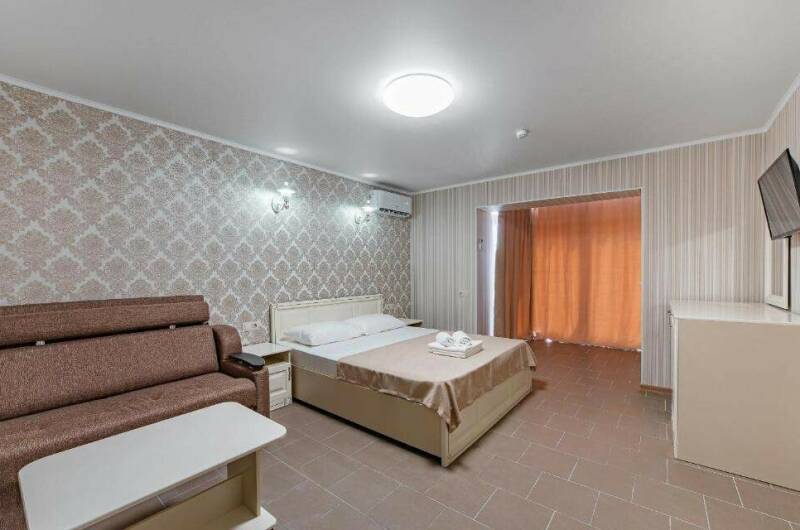 Четырехместный номер Делюкс с балконом