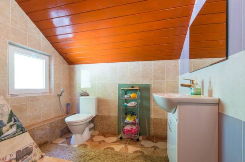 Мансарда с балконом и видом на море