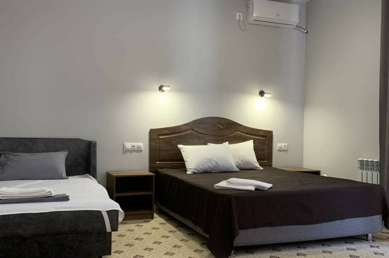 Семейный полулюкс с балконом (4−5 чел.)