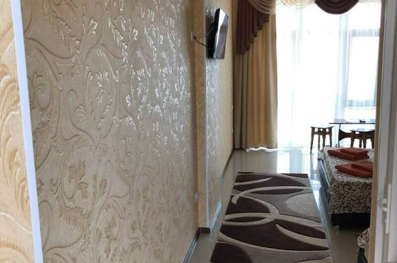 Трёхместный номер с видом на море