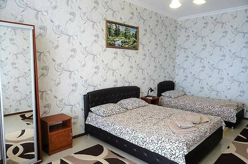 Трёхместный номер с видом на море