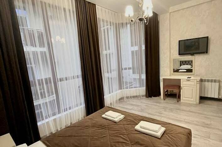 Двухкомнатный с мини-кухней