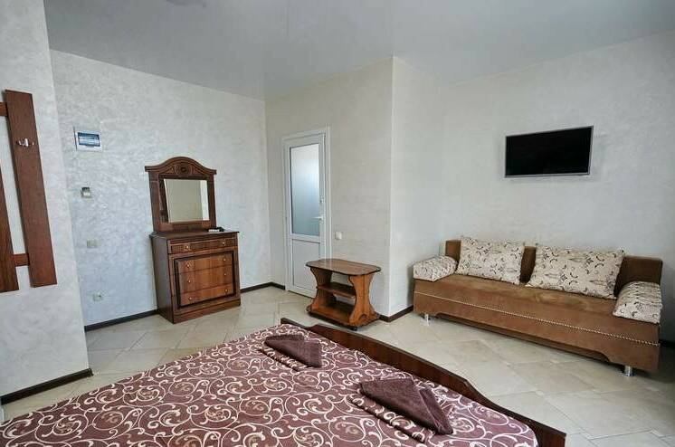 Четырёхместный номер «стандарт"с балконом