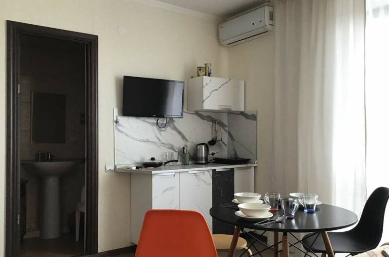 Трёхместный с балконом и кухней