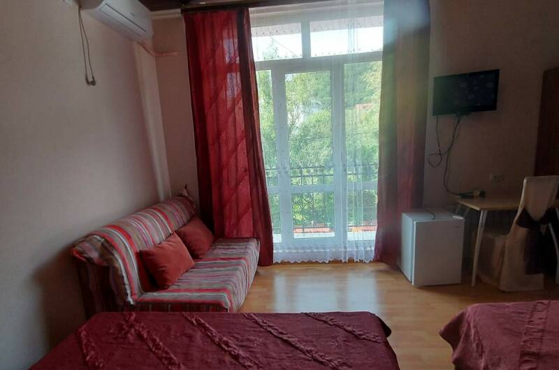 Трёхместный номер люкс с балконом