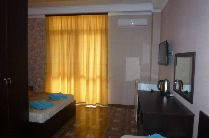 Трехместный номер c балконом