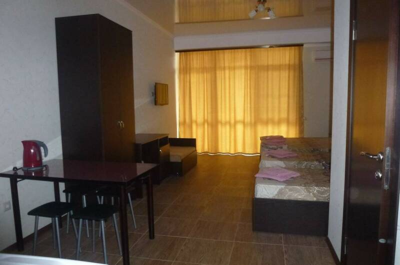 Четырехместный номер cтудия с балконом