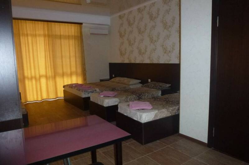 Четырехместный номер cтудия с балконом