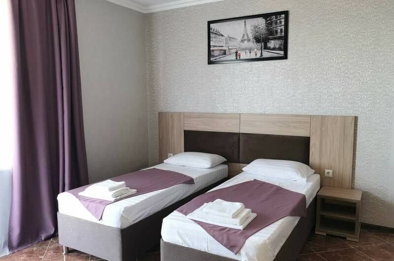 Трёхместный номер с отдельными кроватями