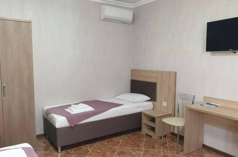 Трёхместный номер с отдельными кроватями