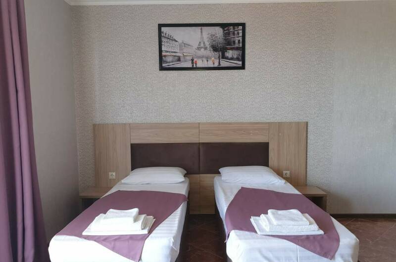 Трёхместный номер с отдельными кроватями