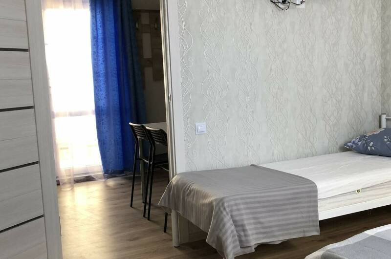 Апартаменты со смежными комнатами (4−5 чел)