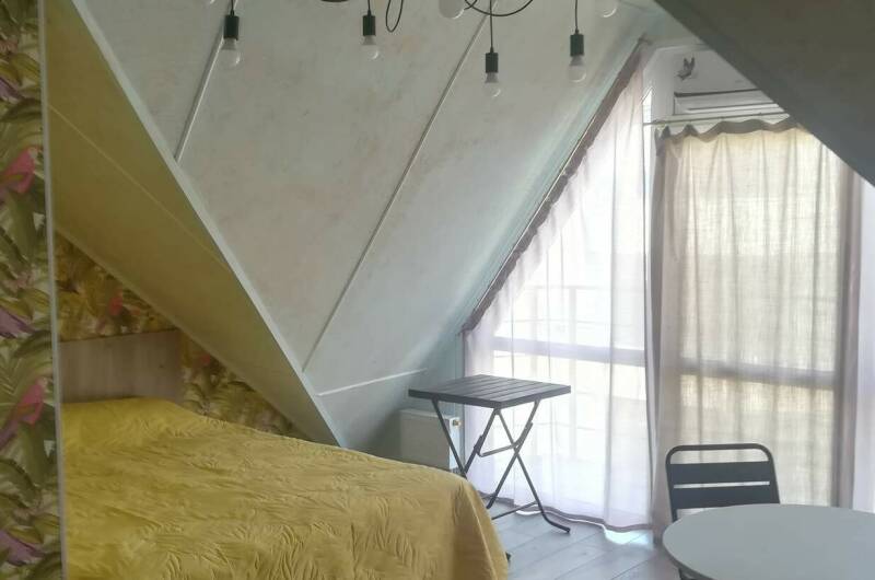 Мансарда с балконом