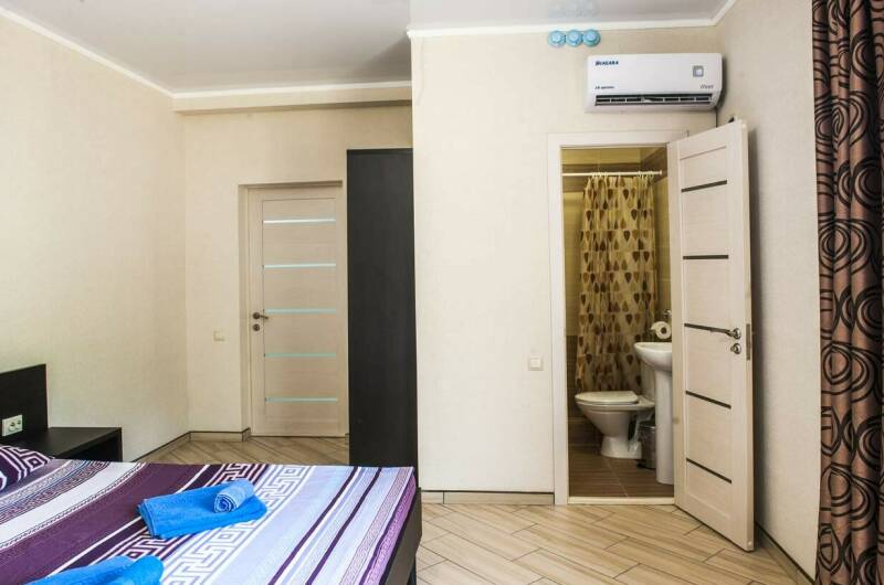 Четырехместный номер с балконом и с видом на горы