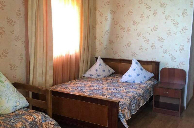 Четырёхместный номер Стандарт с балконом