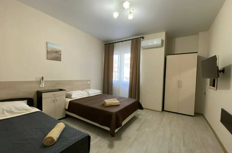 Трехместный номер с балконом