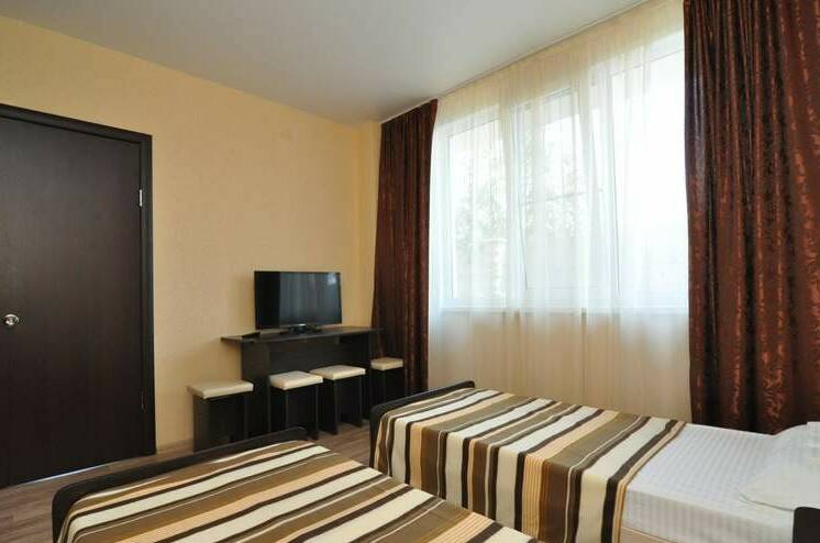 Четырехместный 2-комнатный номер с террасой 1 этаж