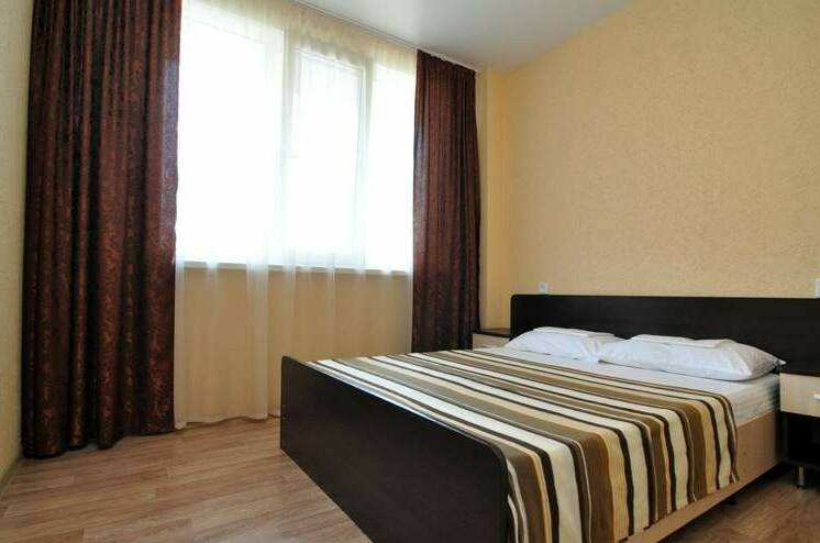 Четырехместный 2-комнатный номер с террасой 1 этаж