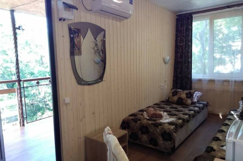 Две комнаты на втором этаже с верандой