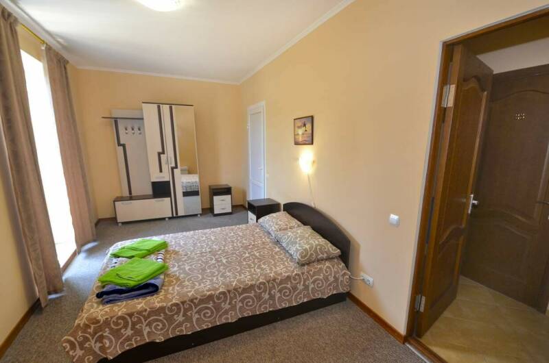 Двухместный с двуспальной кроватью