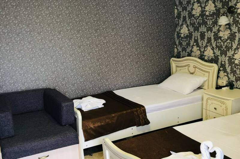 Улучшенный трехместный номер со всеми удобствами