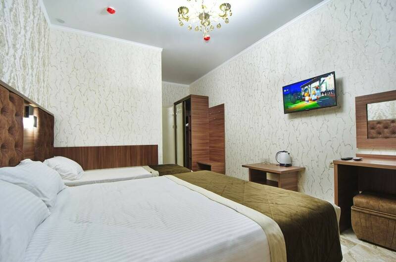 Трехместный номер с балконом