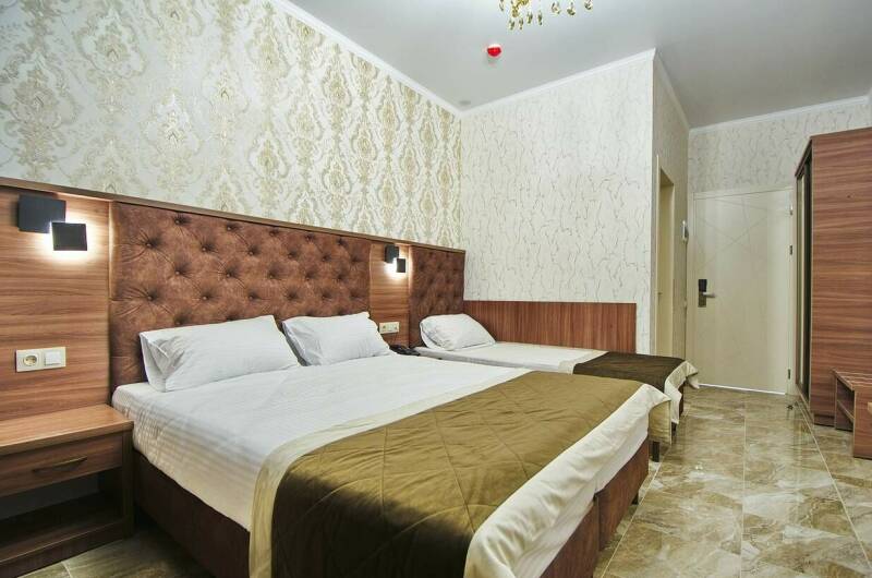 Трехместный номер с балконом