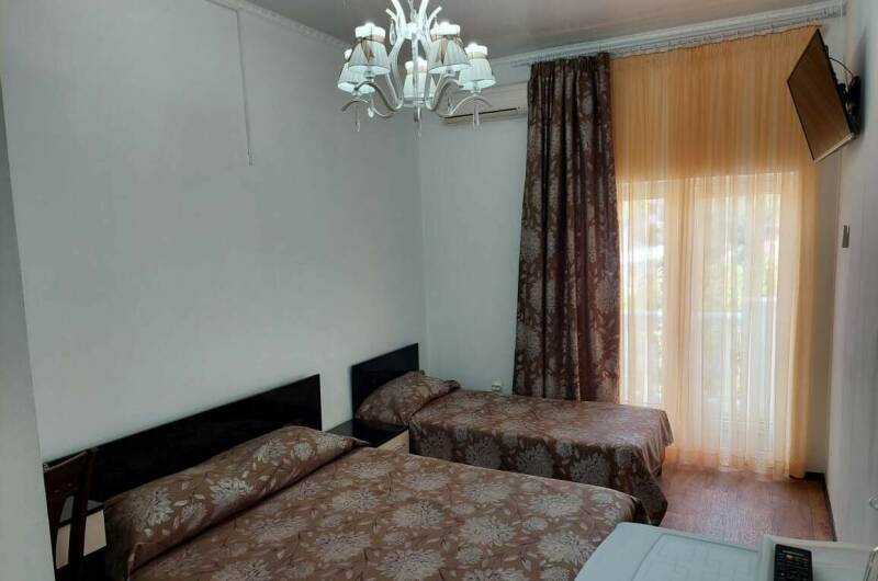 Трехместный с удобствами с видом в сад