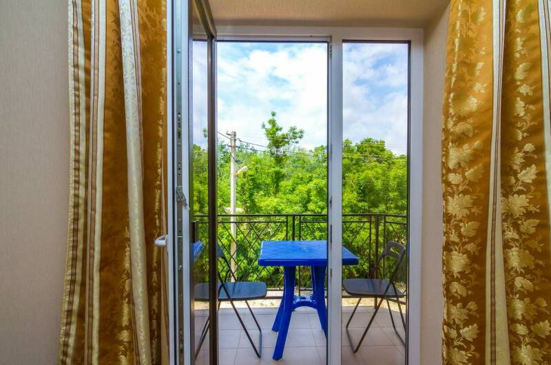 Четырехместный номер с балконом