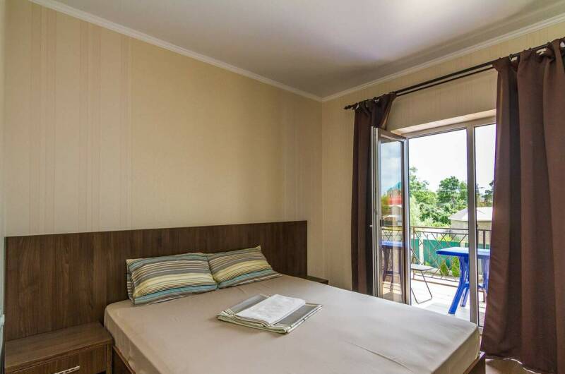 Четырехместный номер с ванной и с балконом