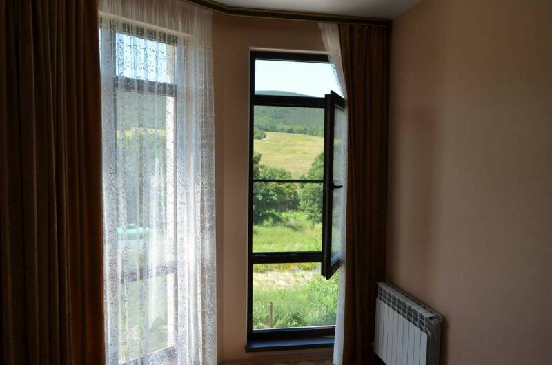 Двухкомнатный номер на 3−4 человека с балконом