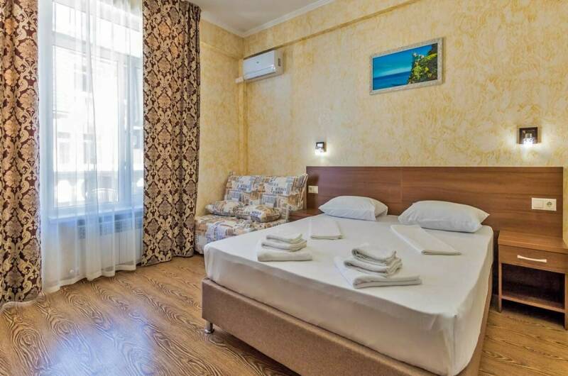 Семейный номер с видом на море и бассейн