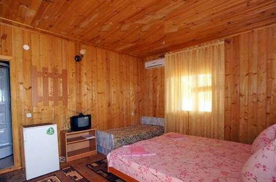Трехместный номер в деревянном корпусе