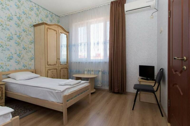 5. Комната с двумя кроватями с удобствами