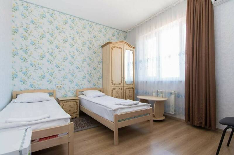 5. Комната с двумя кроватями с удобствами